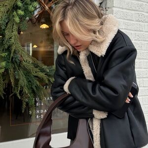 Elegant Black and Cream Teddy Jacket